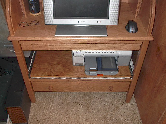 Sliding printer shelf in